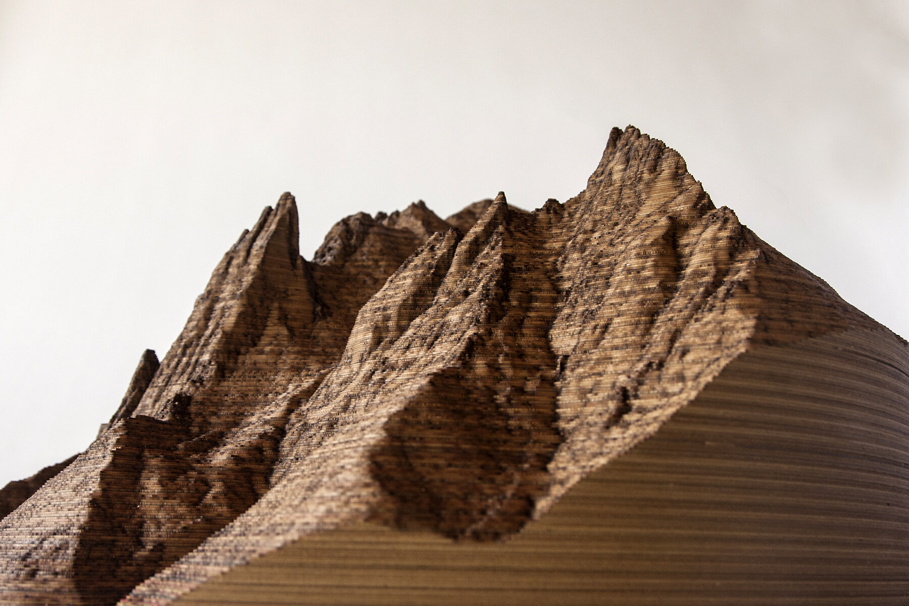   Christopher Warren   Flatirons  laser cut matboard 22x22x13 $2600 