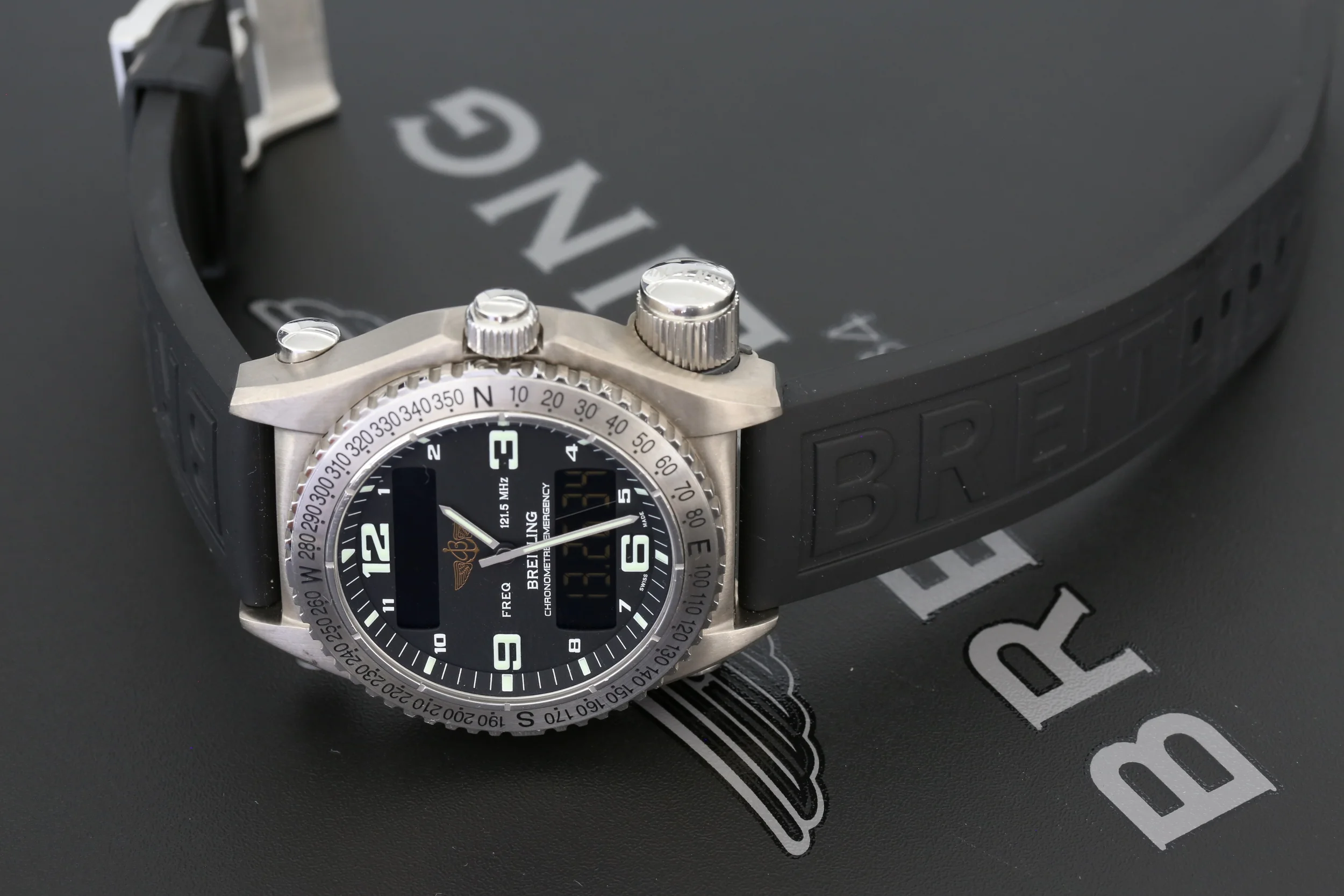 In addition to the emergency transmitter, Ref. E76321 features an analog/digital display with dual-time zone, alarm, chronograph, <24 hr count-down time and perpetual calendar. The sapphire crystal glass is dual coated with an anti-reflective material that can give a blue hue in certain light.