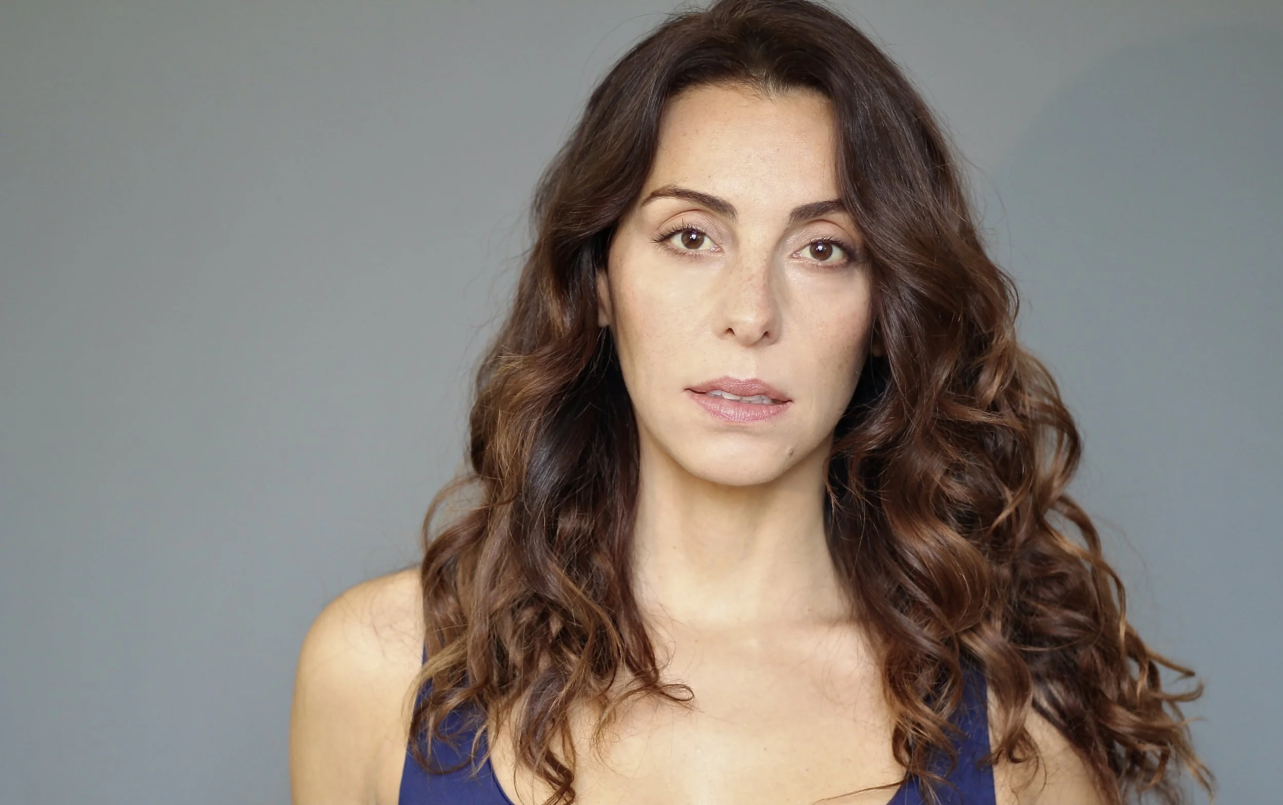 Nadia Santos HEADSHOT 2.JPG