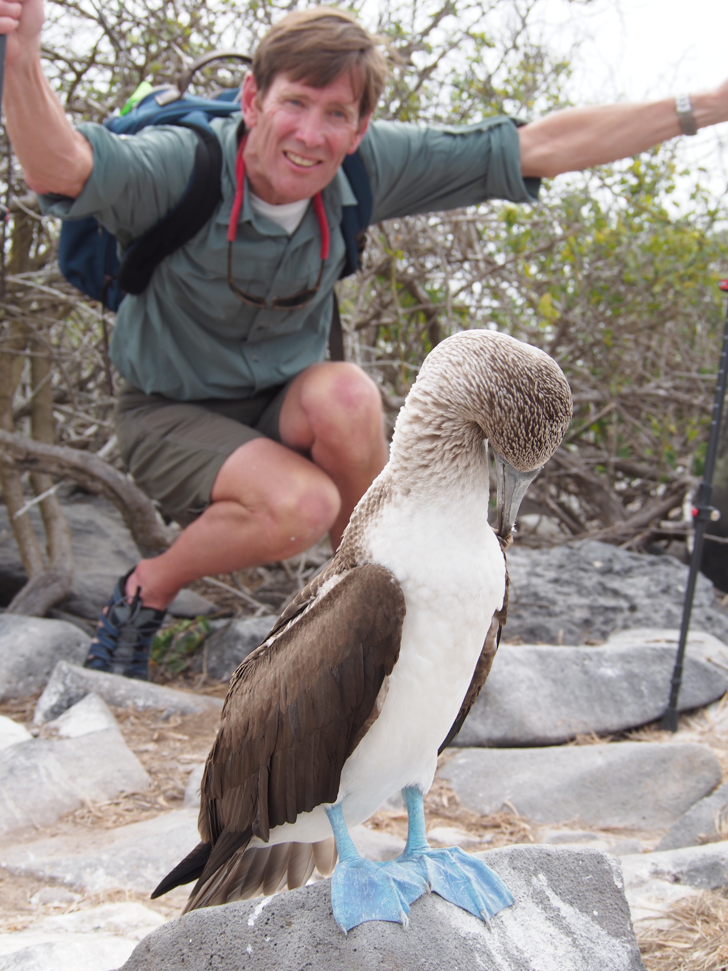 John with a blue footed boobie. The favorite local tee shirt says "I heart boobies"