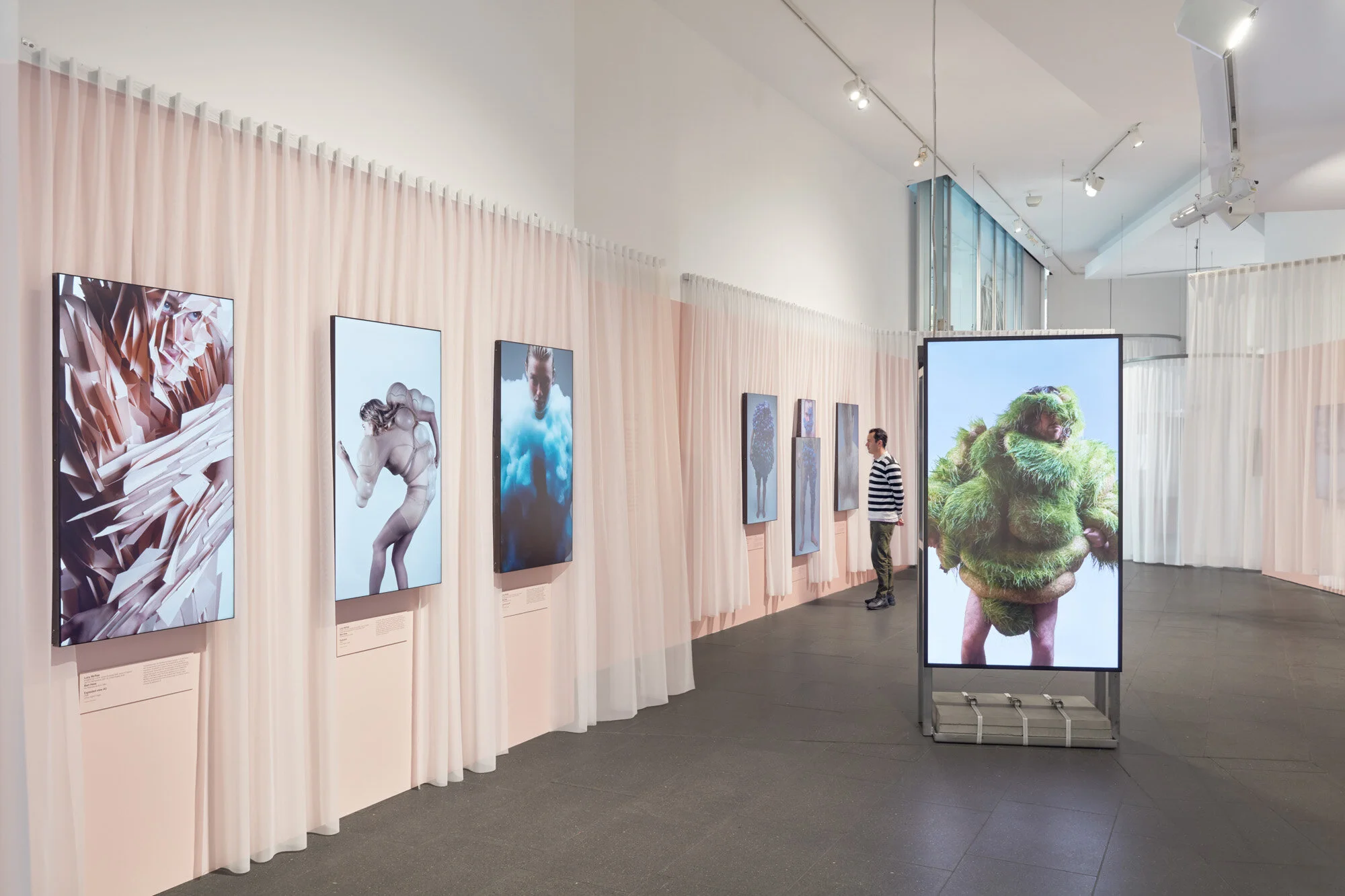 I created a gradient wallpaper that spanned the 200m+ parameter of the exhibition, transitioning from pure white through to dark skin tones using the Fitzpatrick scale. An extremely complex print production and install job due to the complex exhibit…