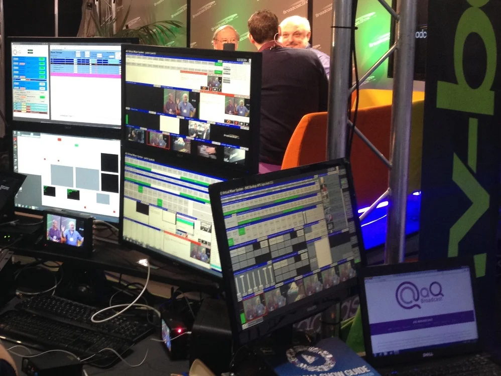 The aQ Production Suite in use at BVE 2014, showing four operator screens (in this configuration) and one administrator position. 