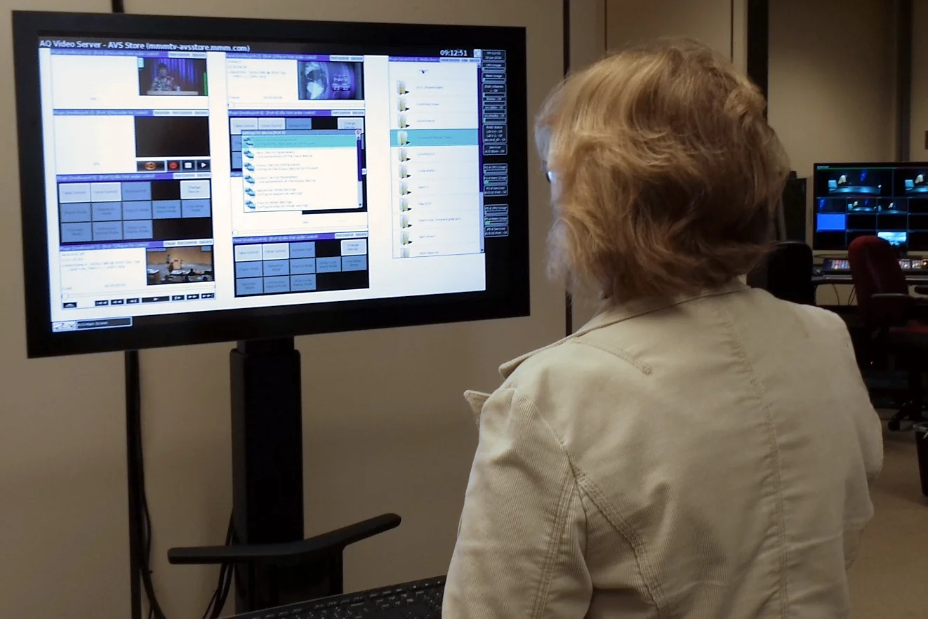 3M Media Solutions Technical Coordinator Marilyn Cook controls the aQ Broadcast system from 3M's head-end facility.