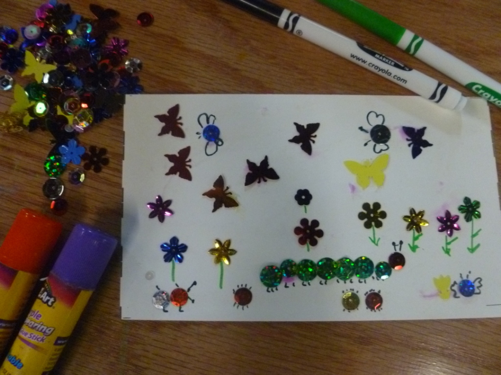 creating a bug and butterfly scene with sequins