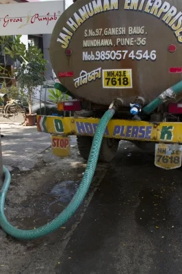 Water trucks, like this one, are used to deliver clean water to areas of Pune that don't have a connection to the municipal pipes. In other cities, like New Delhi, tankers have developed a stake in the local government and discourage building of reservoirs that could take away their business, Aushutosh Mishra said. 