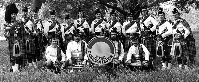 Photo courtesy of Phil Lenihan DMaj Bill Irwin David Laird Robert Witten Guy Bennett David Bennett Unknown Rich Peterson Callum Logan Archie Kelly Phil Lenihan Dan Dempsey PMaj John McPhee Dave Maich Tony Fuentes Unknown James Brown Royal Canadian Legion (1972 approx.)