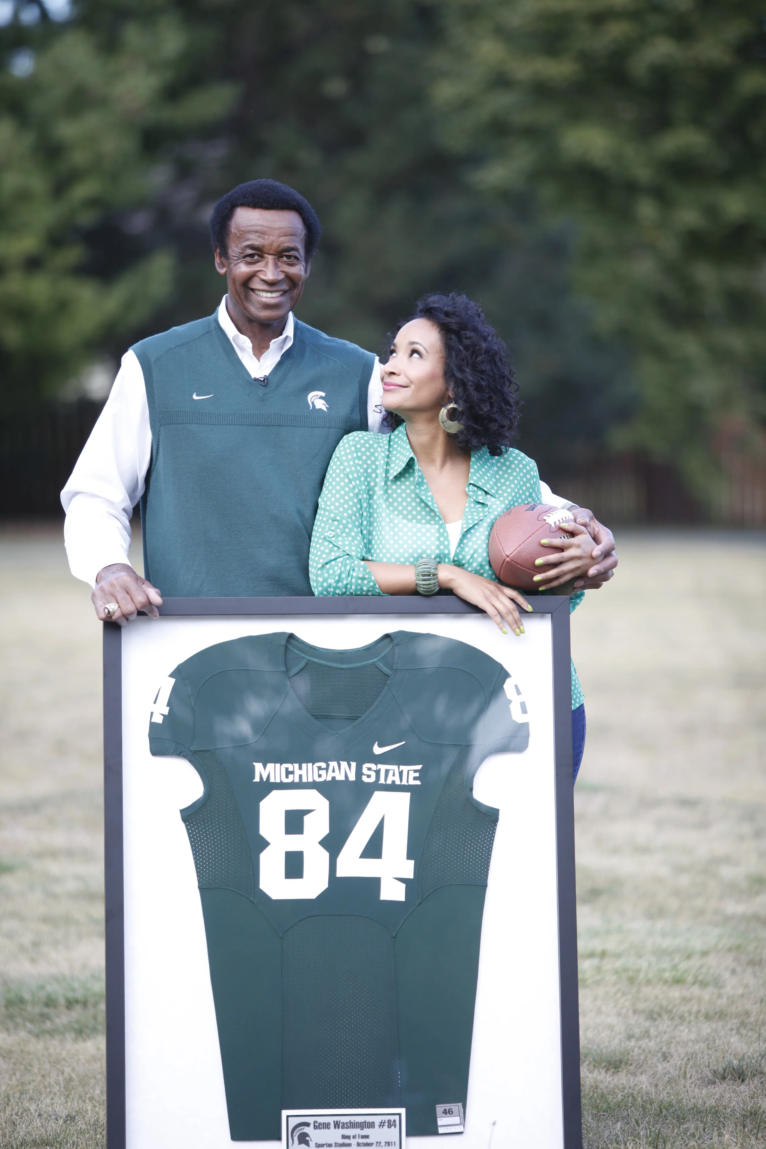 Gene Washington and Maya Washington with Retired Jersey.jpg