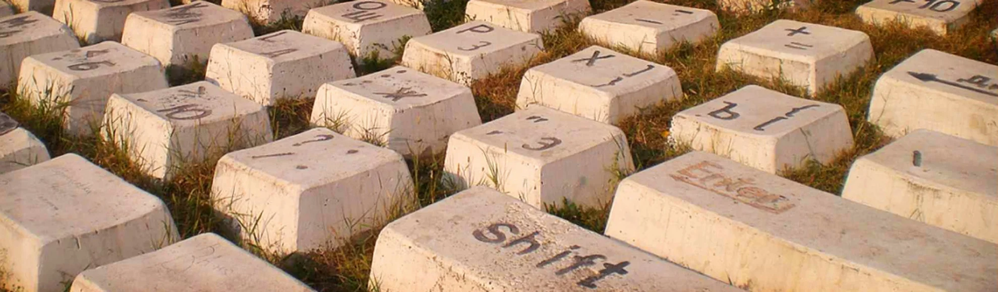 computer-keyboard-stones-on-grass-background-header_banner.jpg