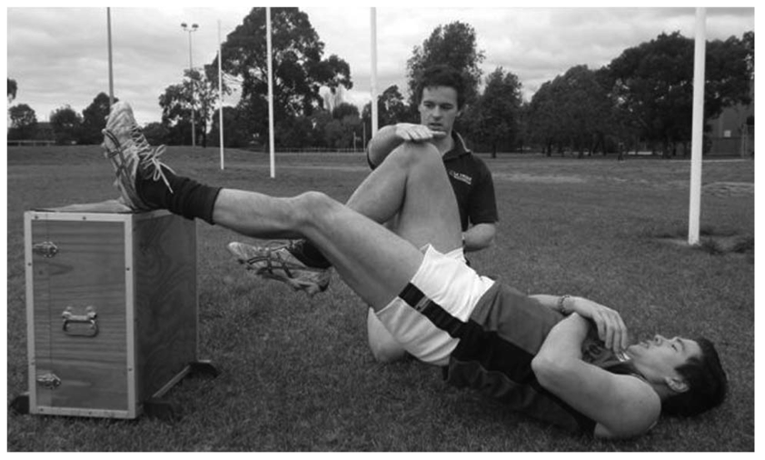 Grant Freckleton assessing hamstring muscle strength using the single leg hamstring bridge.&nbsp;