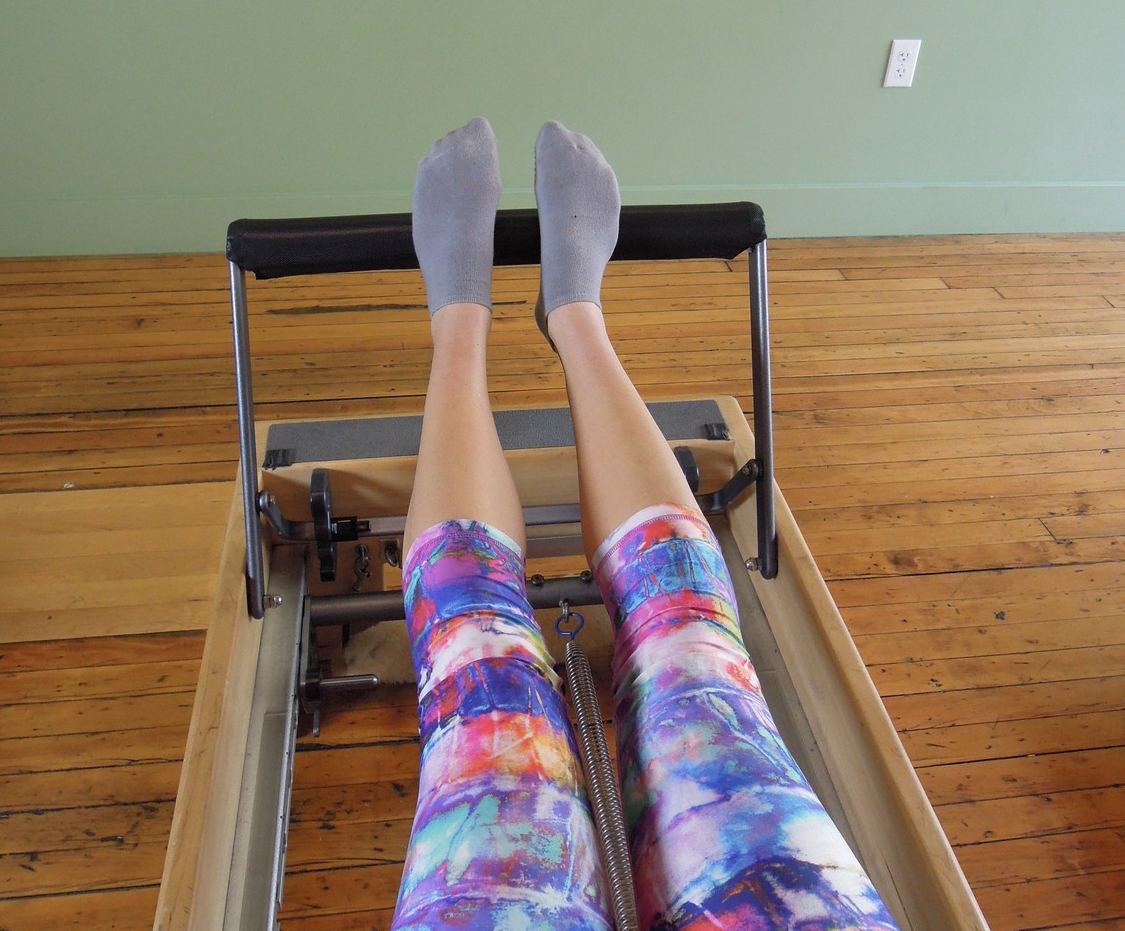 Double leg press arches on bar