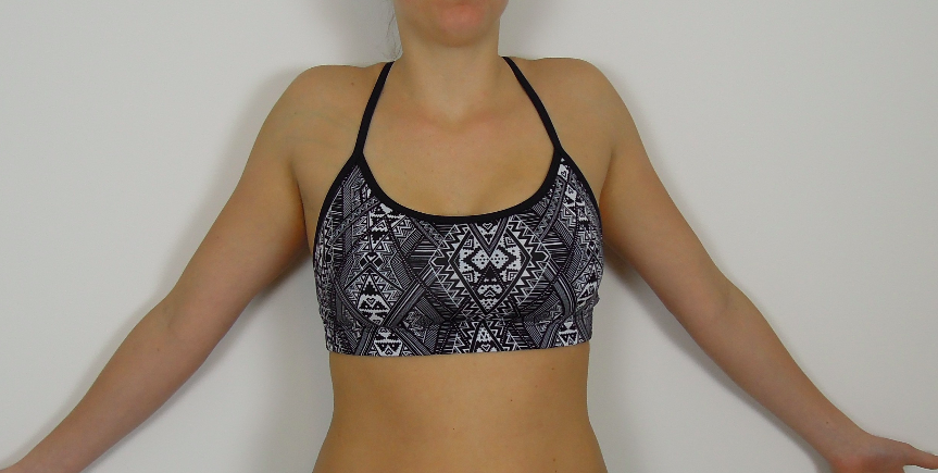 Bilateral shrug against wall