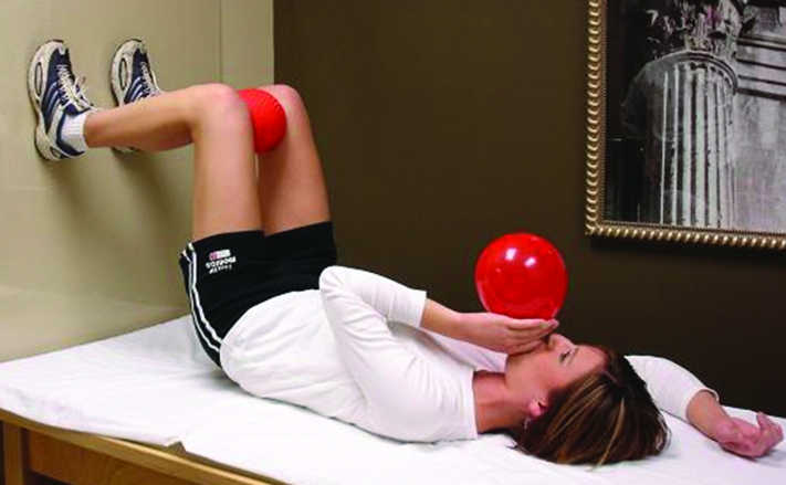 90/90 bridge with blowing into a balloon. Image credit " Postural Restoration Institute " (used with permission).