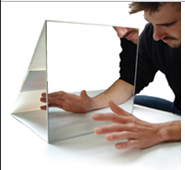 Mirror therapy for hand treatment. Image courtesy of Google Images