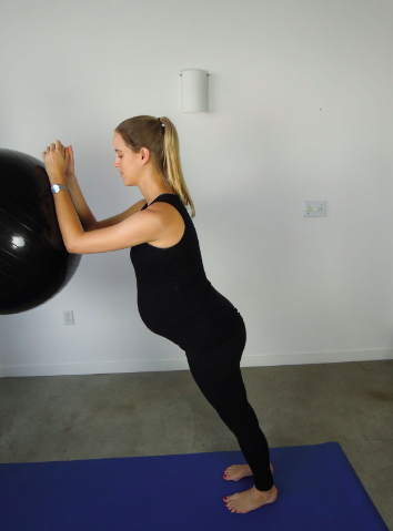 Static forearm plank on ball in standing (easier)