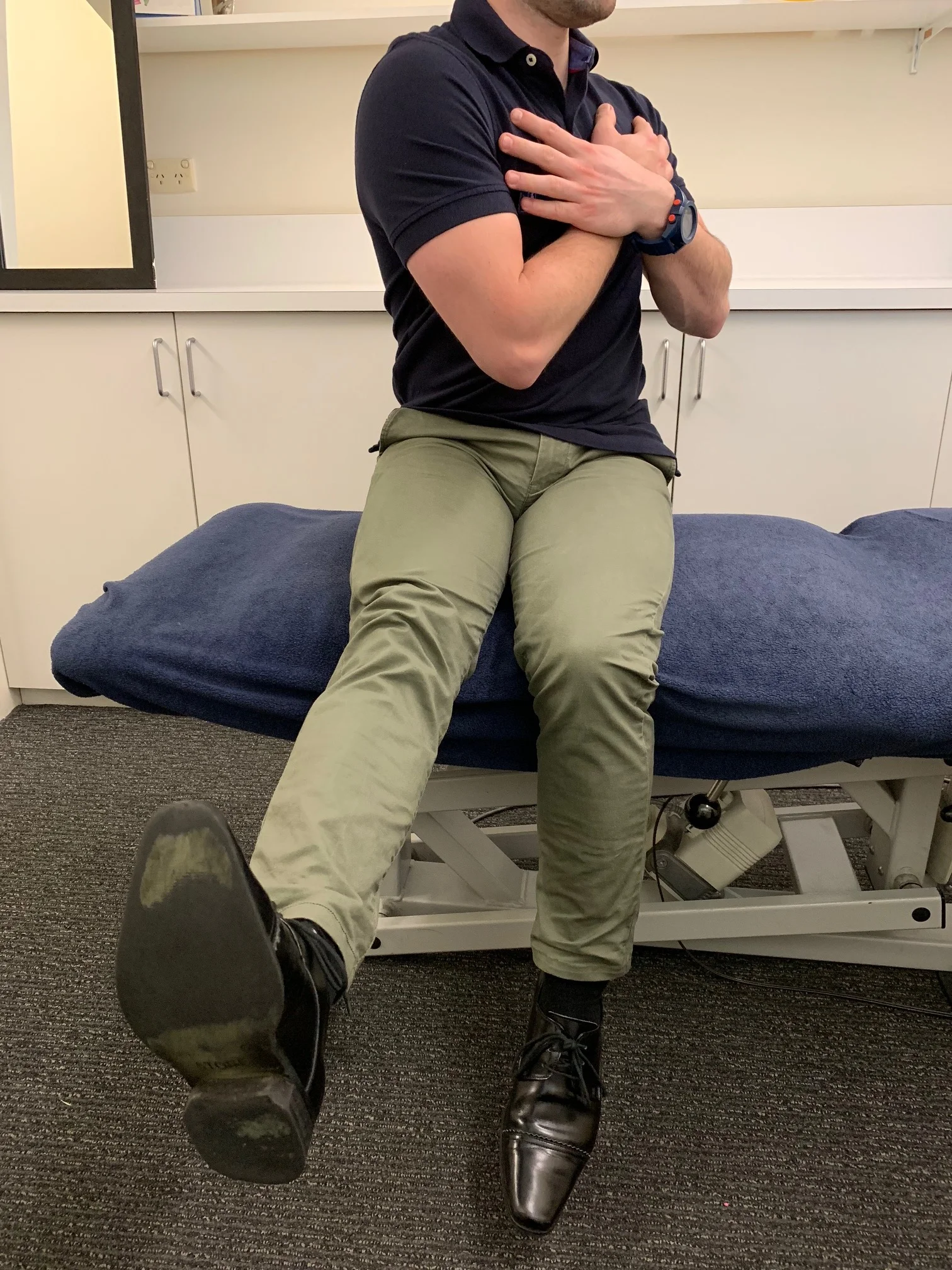 Sitting L Thoracic Rotation, with R Straight Leg Raise & Dorsiflexion.