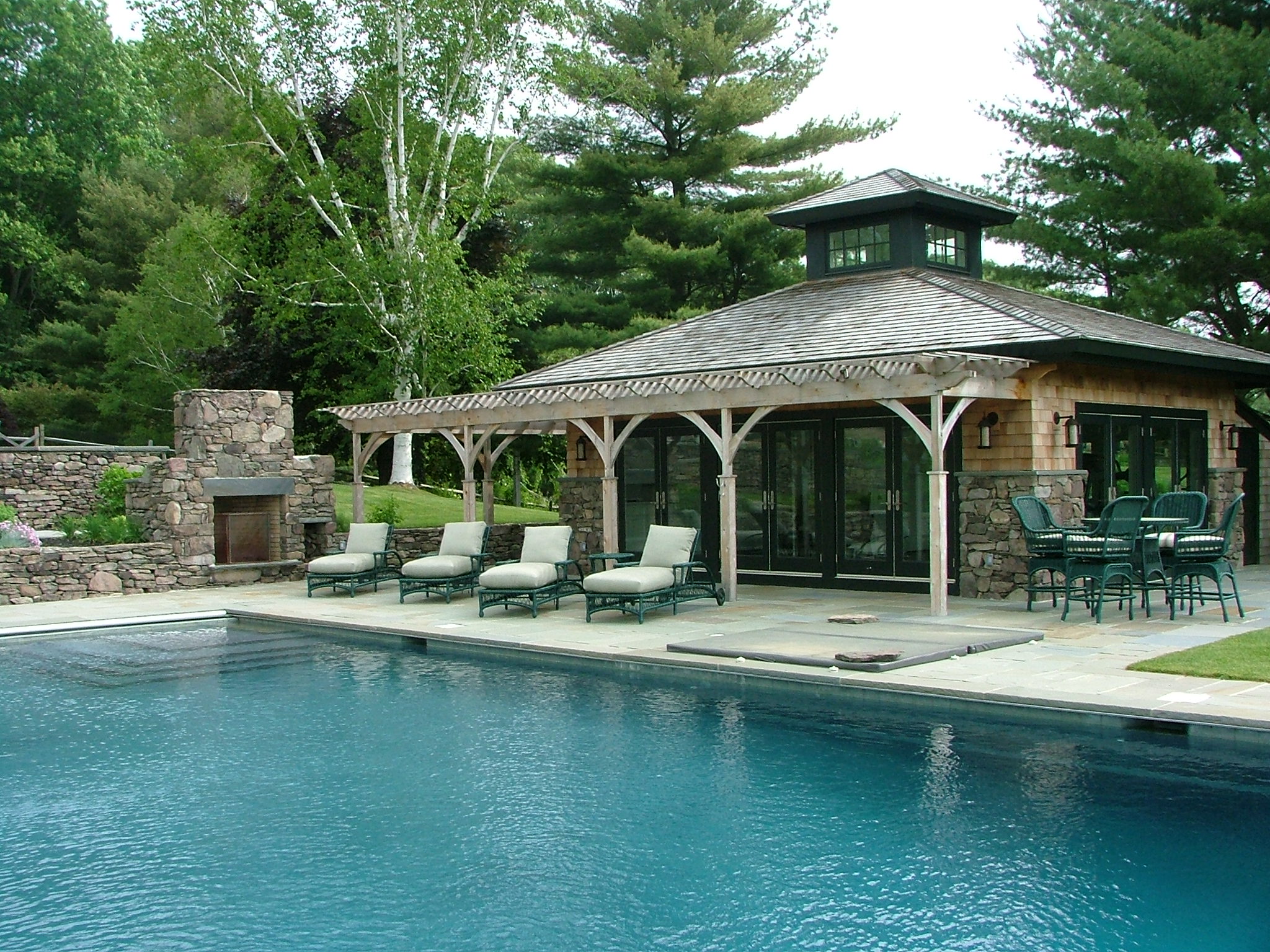 Pool house with shade pergola