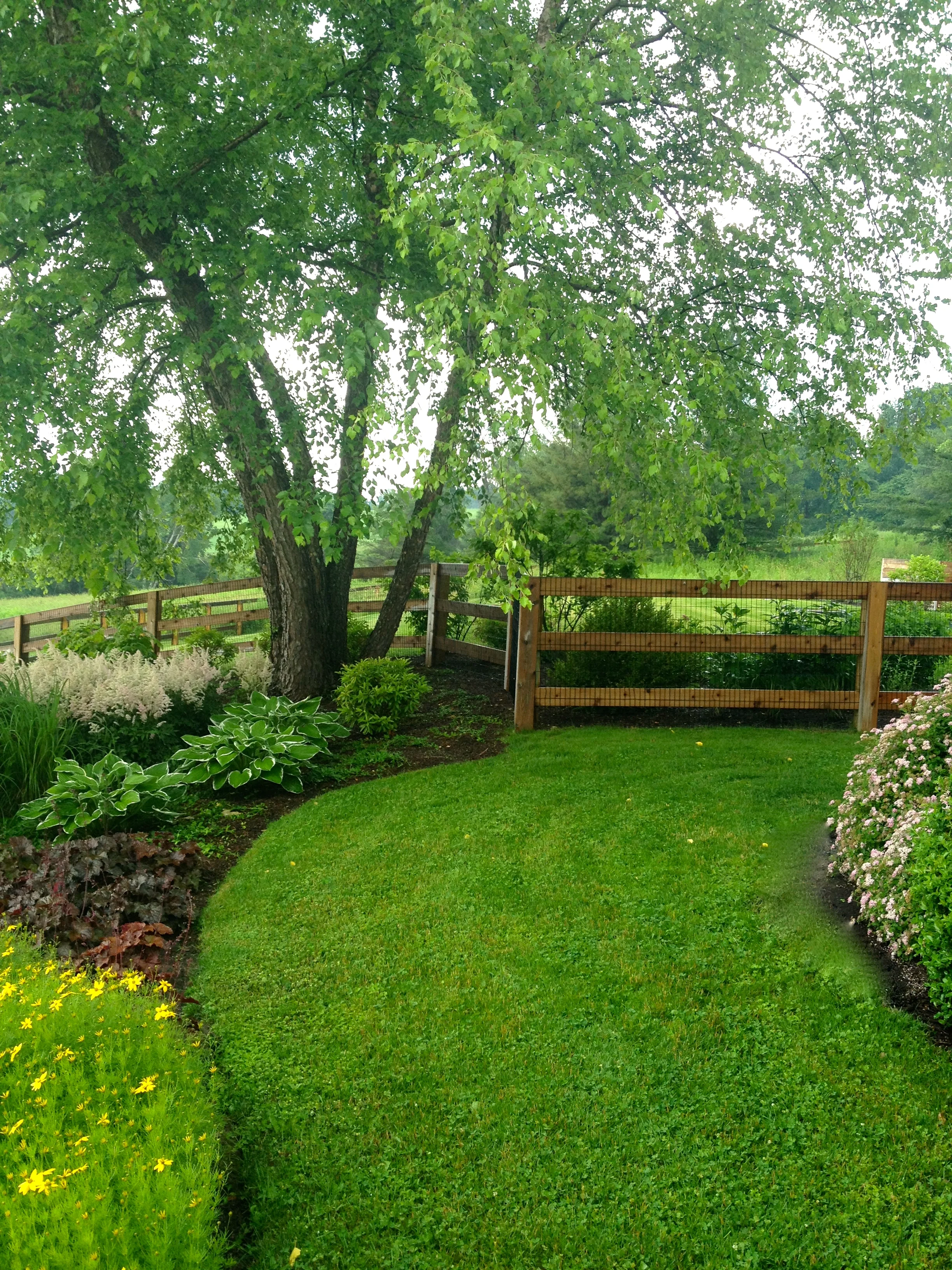 Behind the garden is a path to the pool