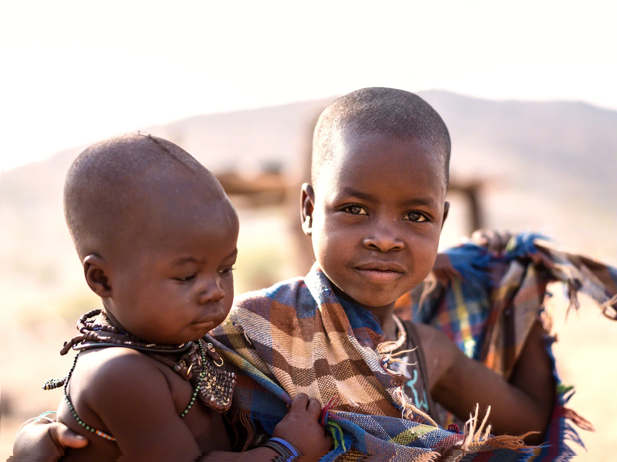 Himba siblings, Epupa Falls, Namibia