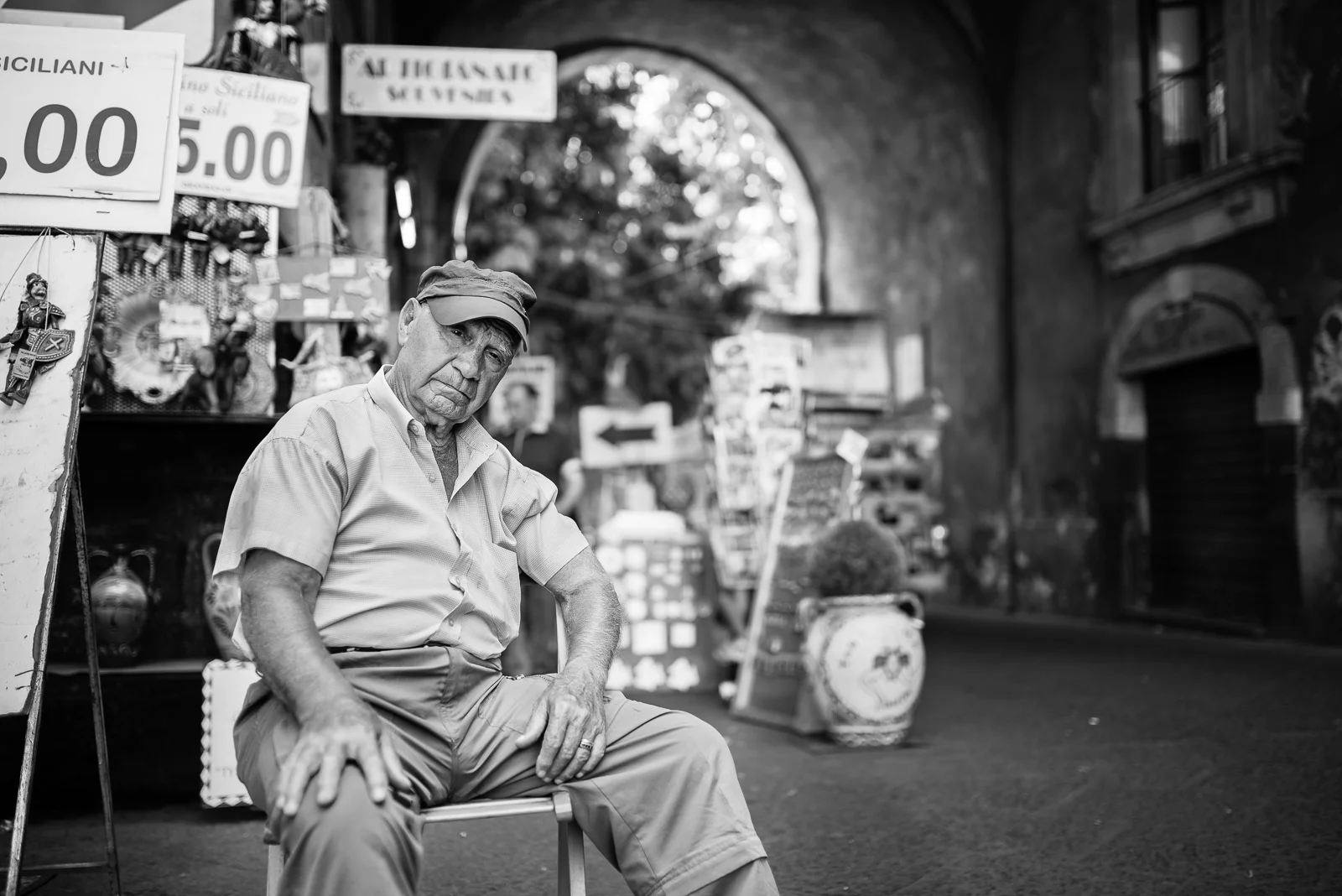 Catania local market, this man was sleeping with an eye open to check his goods