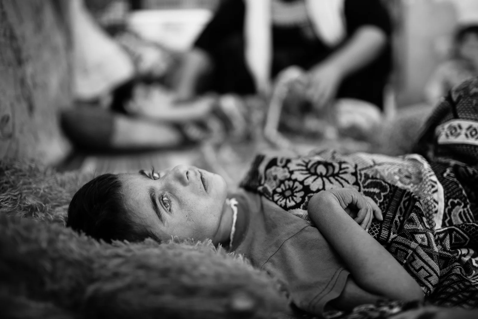 A sick child, building under construction in Zakho