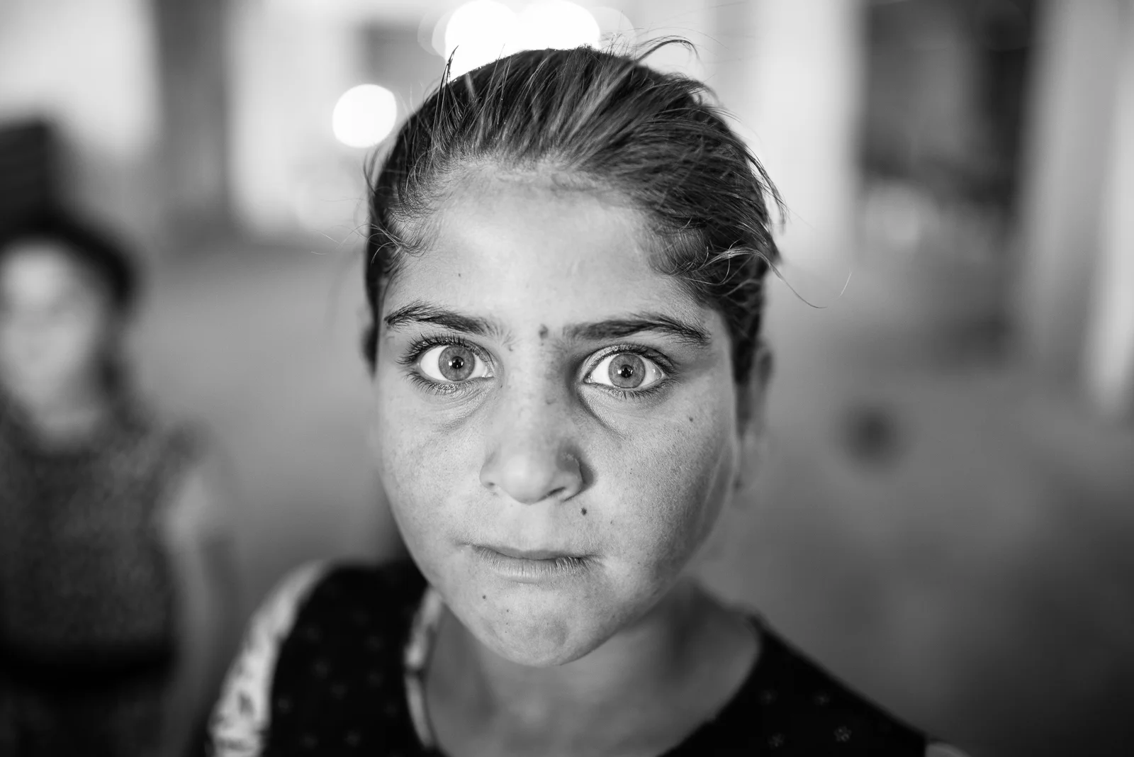Yazidi girl inside the buildingunder construction in Zakho