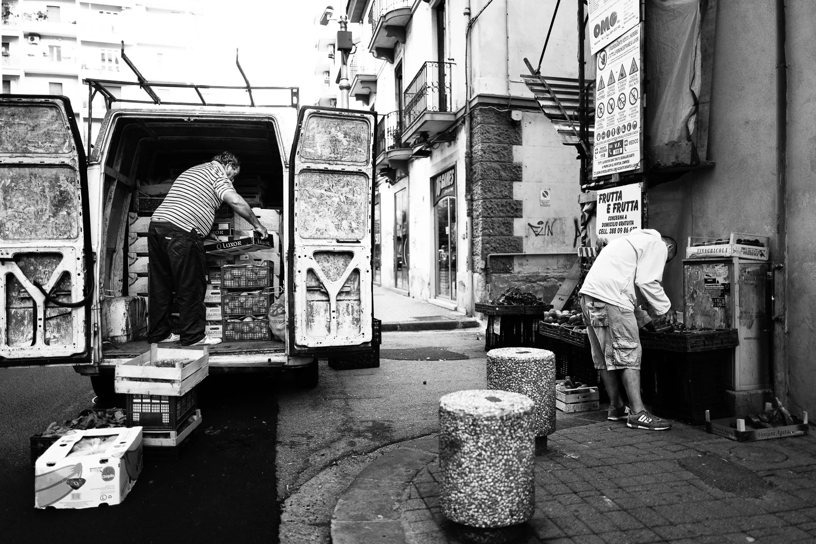 Two men are preparing the local market