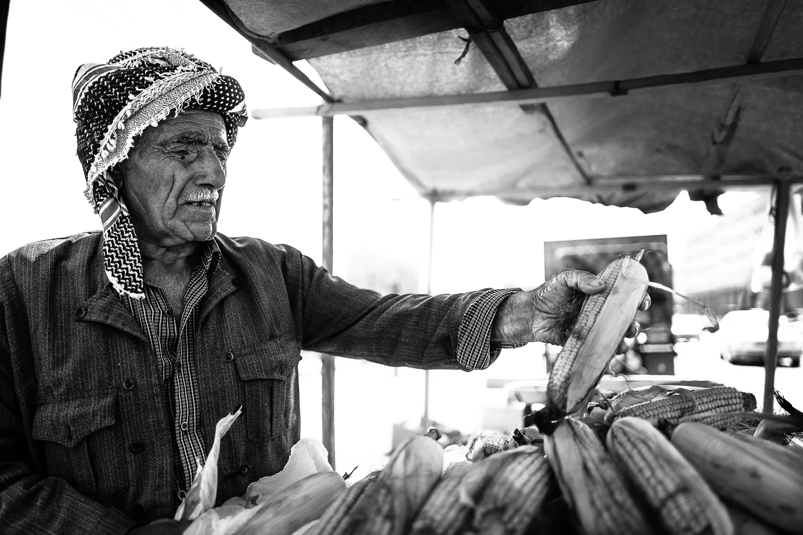 Corn seller in Erbil bazaar