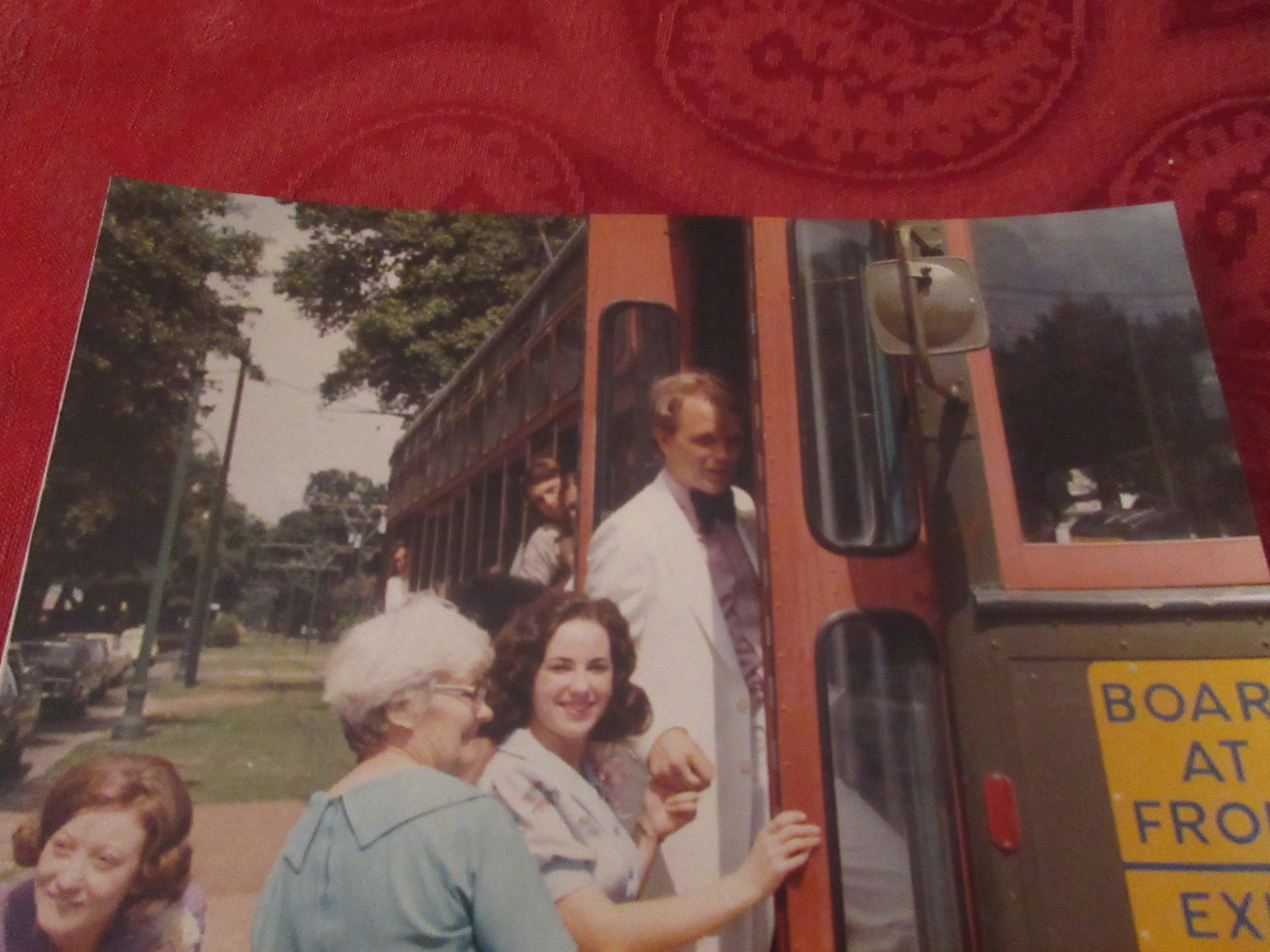 OUR SECRET GET-AWAY ON A STREETCAR CAROLYN IS TELLING EVERYONE TO FOLLOW US. THE DEAF LADY IN BLUE IS FOLLOWING US & SHE DOESN'T KNOW IT!