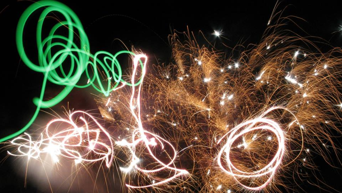  Long exposure photograph with LED lights, fireworks, and flash lights. 