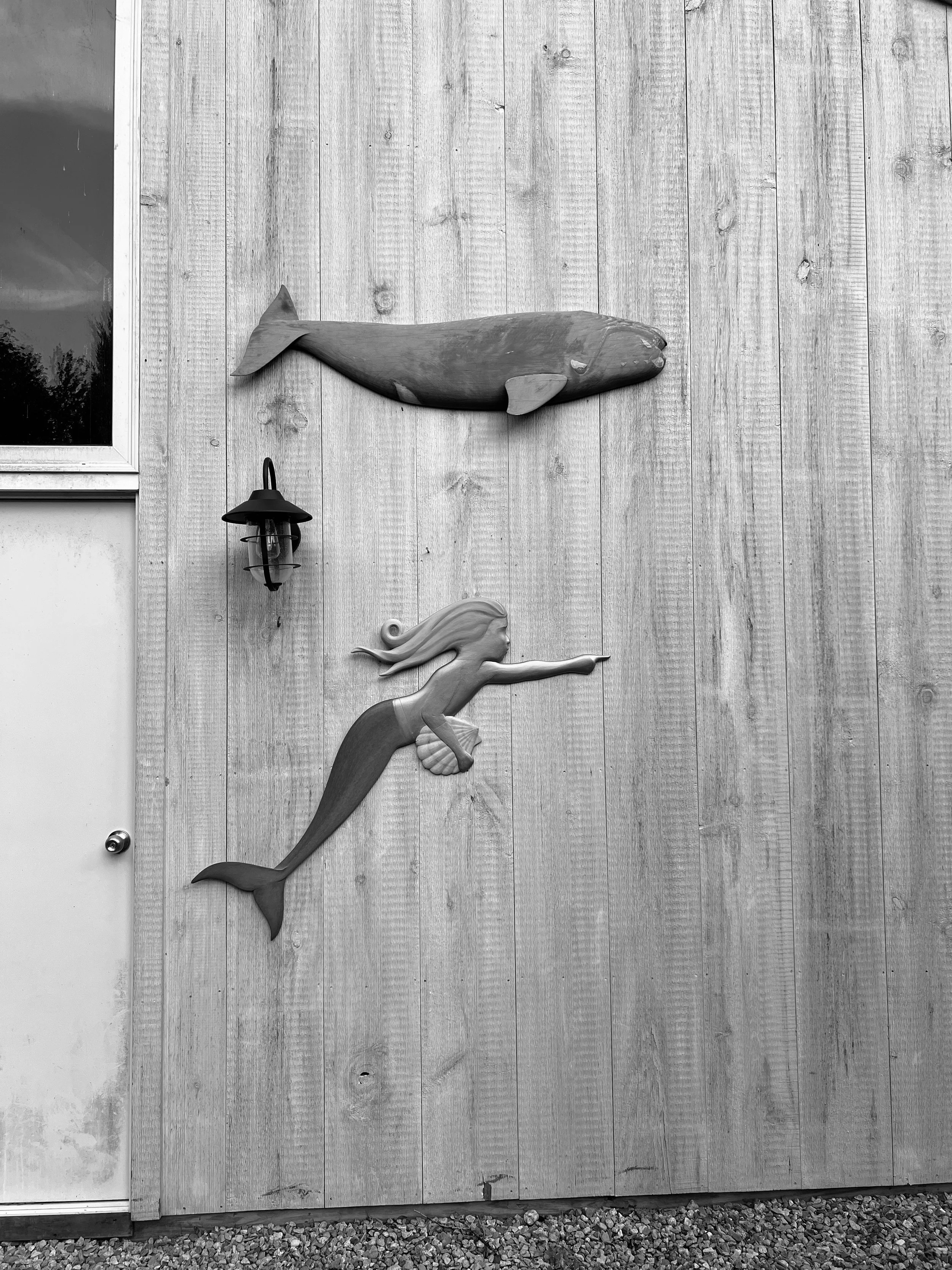 Mermaid and Right Whale on Barn