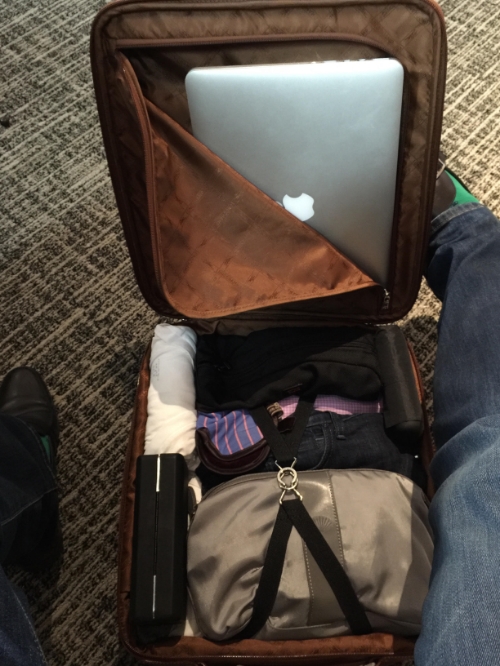 Packed as shown (including worn shoes, jeans, and blazer) for 4 days, 5 nights including 3 major client meetings