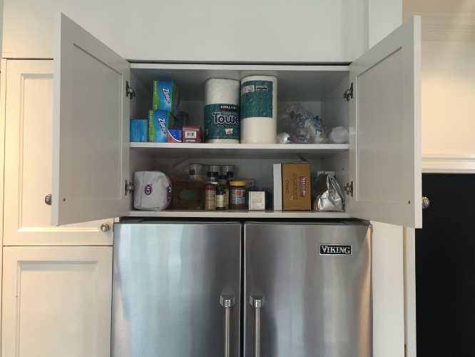 Backup kitchen items go here... because I'm not going to store something that makes me get on a stepladder multiple times a day!