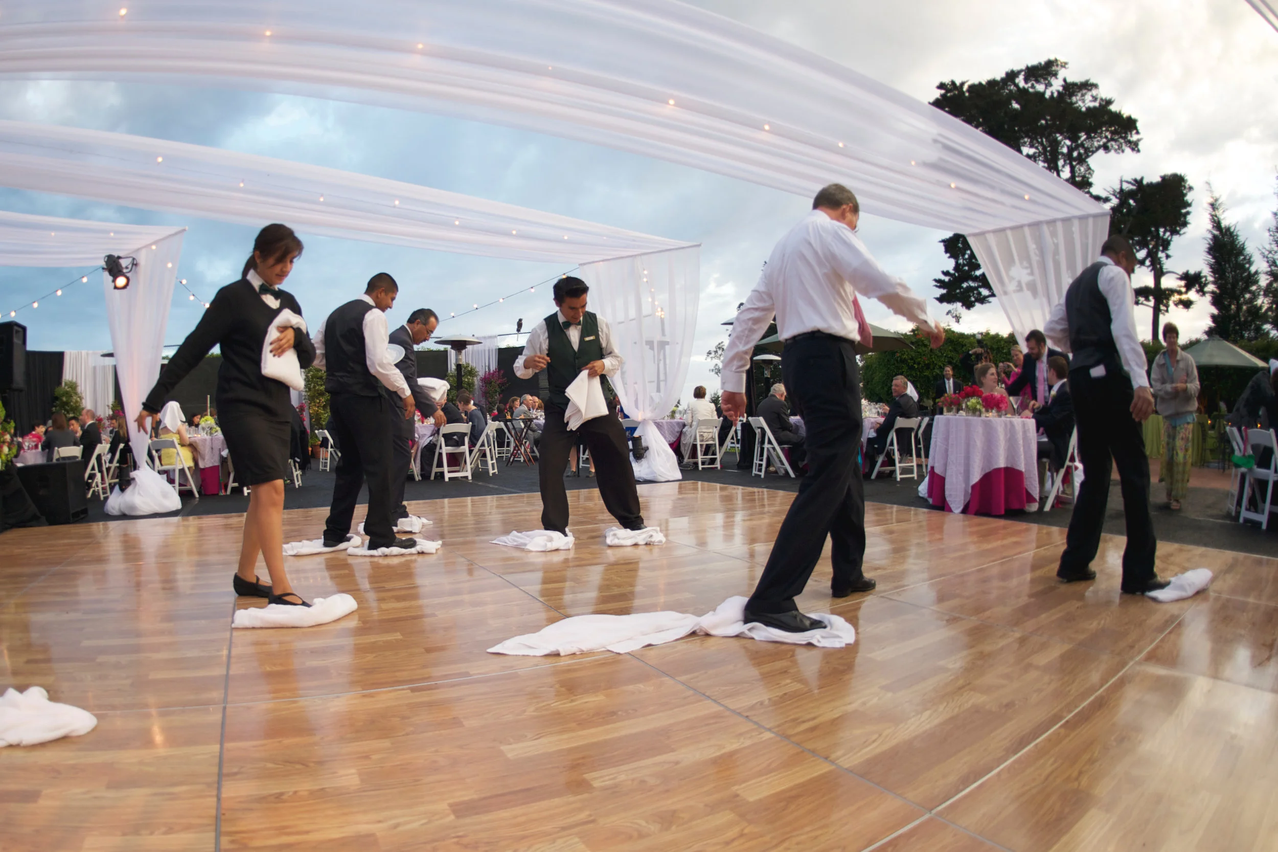 It did, in fact, rain on our wedding day! My planner had the staff (enthusiastically assisted by my dad) out there cleaning off the dance floor plus a backup plan in place, and it became a funny story to tell instead of a disaster.