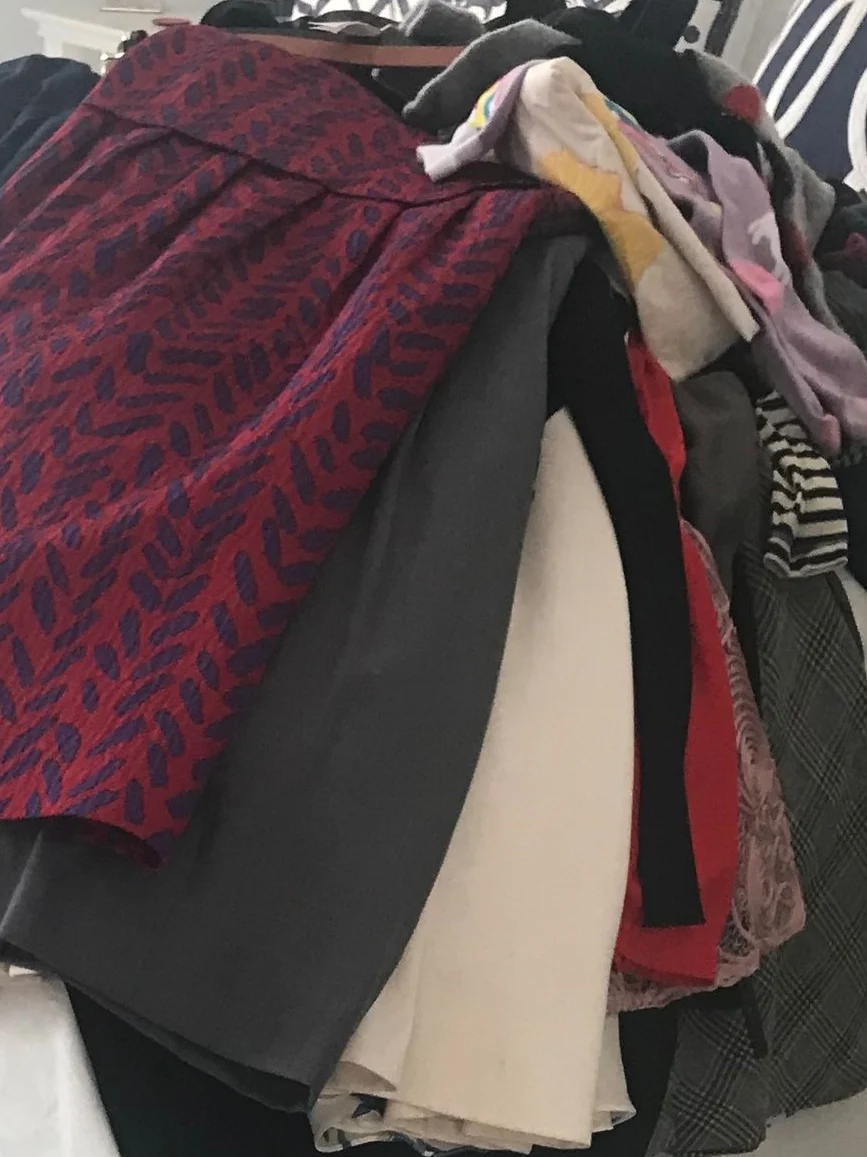 Pile of discarded clothes ready for consignment and donation