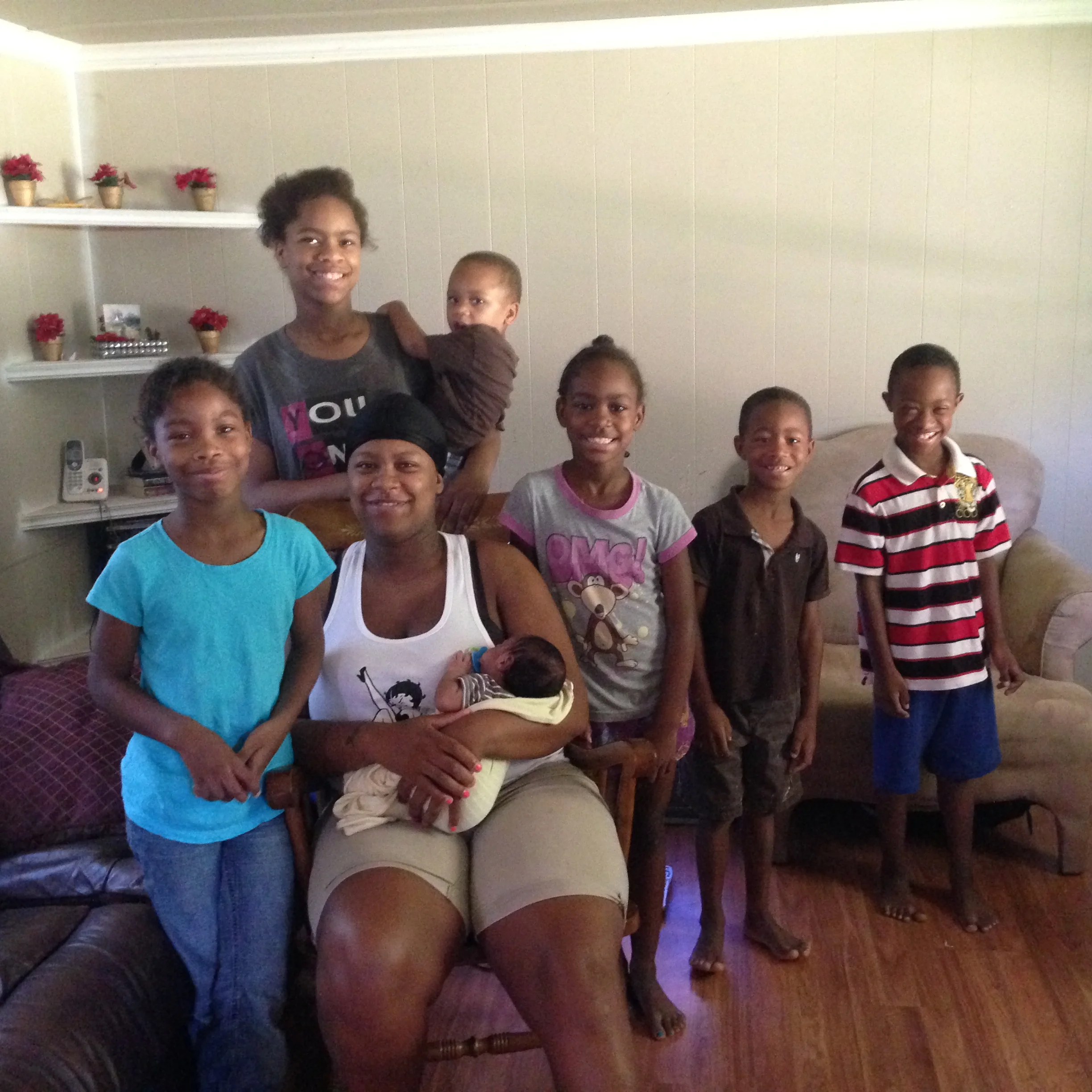 GOD'S BLESSINGS BRINGS SMILES TO PRECIOUS FAMILY