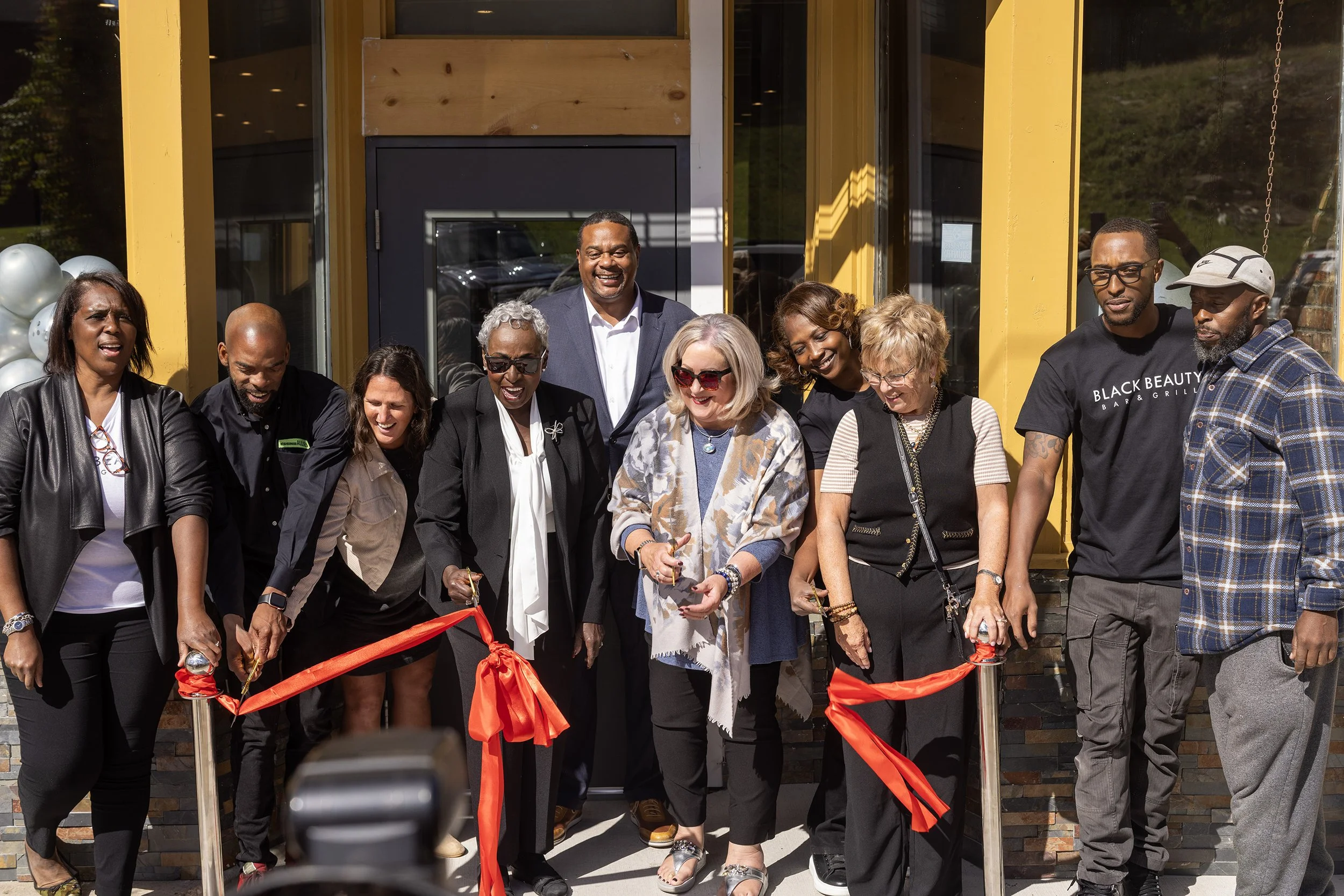 Roberta "Ms. Bert" Cole Brassel, celebrating during the reopening of Black Beauty Bar &amp; Grill 