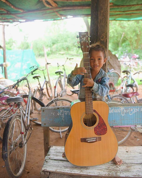 You’ve got more in common with people in these “foreign” countries than you’d think. Go get to know them and surprise yourself. Charat - my new best friend here in Cambodia - wears a Clemson patch on his dusty, torn jean shirt and loves bicycles and guitar. | Cambodia, Asia
