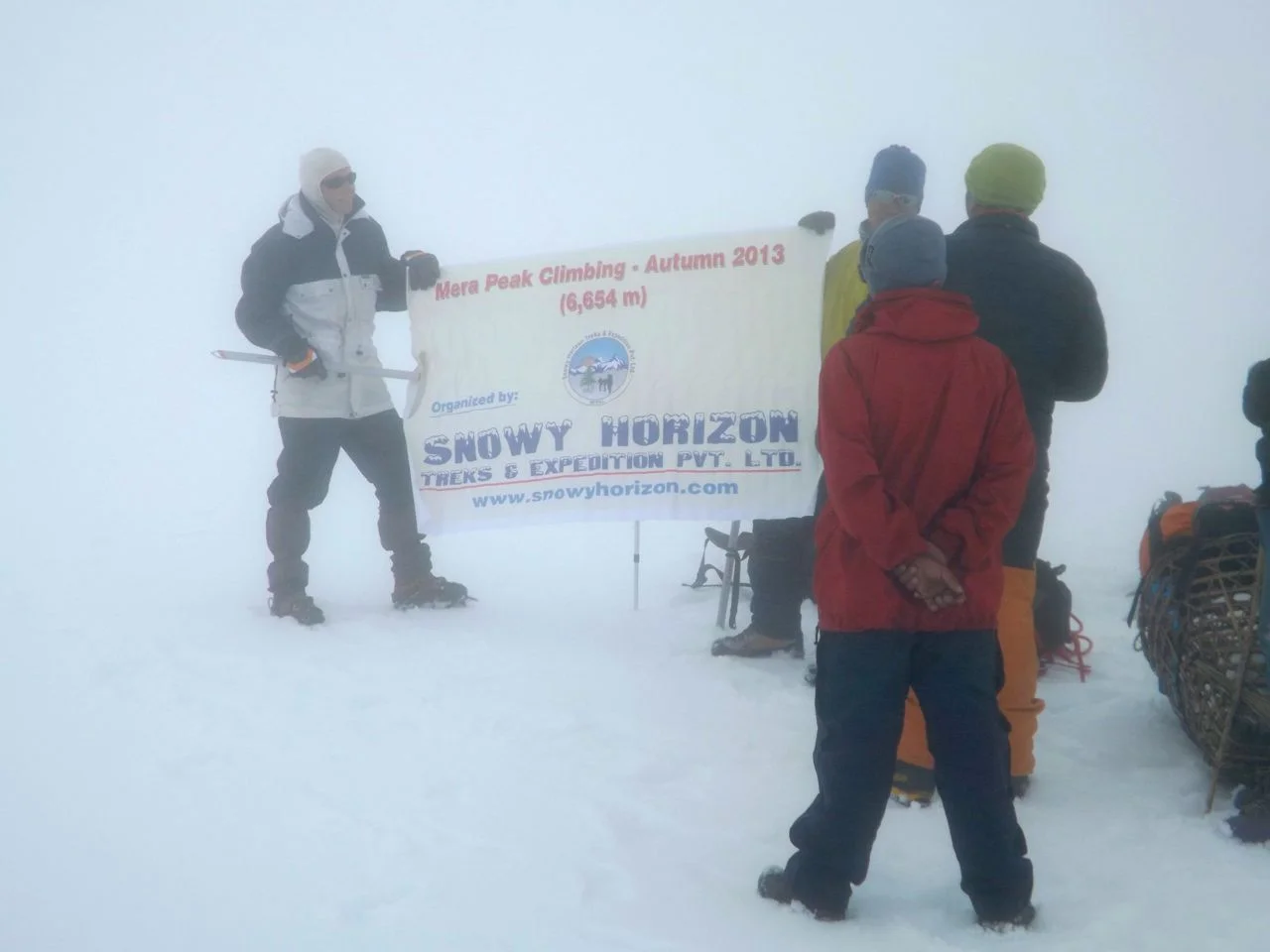 We were in a cloud with snow, could not find the high camp. We contempleted the situation and decided to take safety first – we turned back from about 5900m.