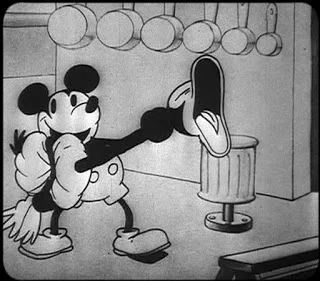 Still from the famous Turkey in the Straw sequence in Steamboat Willie .