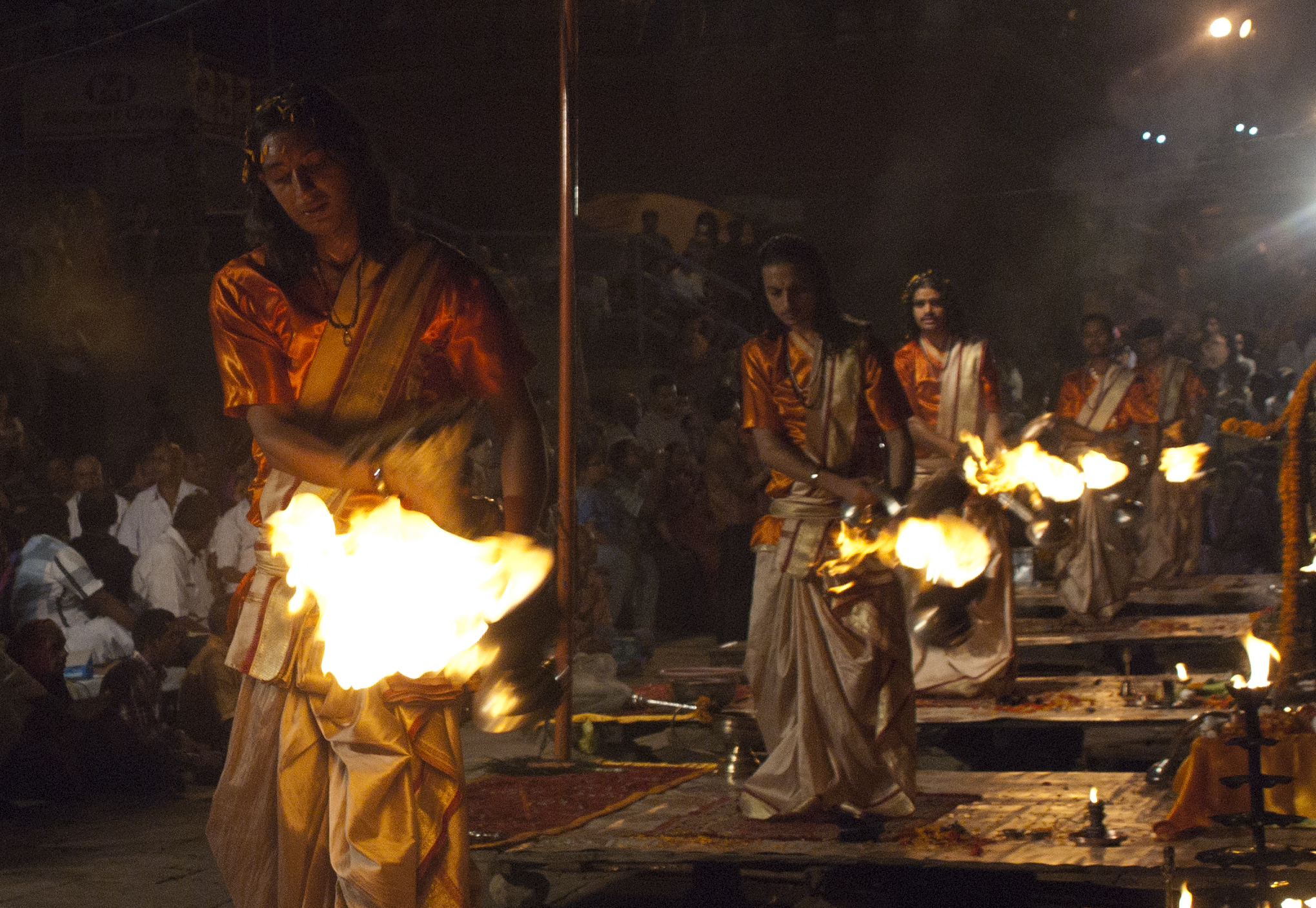 Fire dancers perform in the nightly ceremony along the Ganges. 