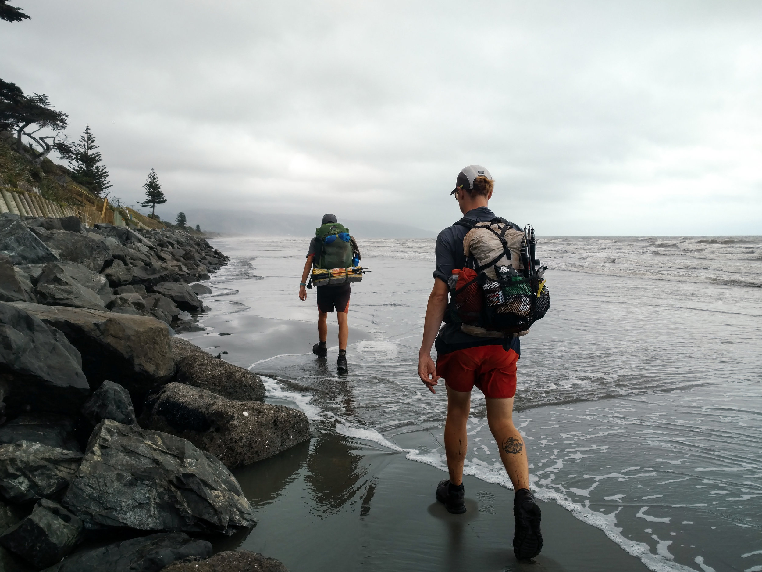 Jonathan and Charlie get their feet wet at high tide photo/ Molly