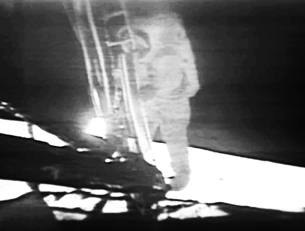 Neil Armstrong first steps on the Moon shown live on TV