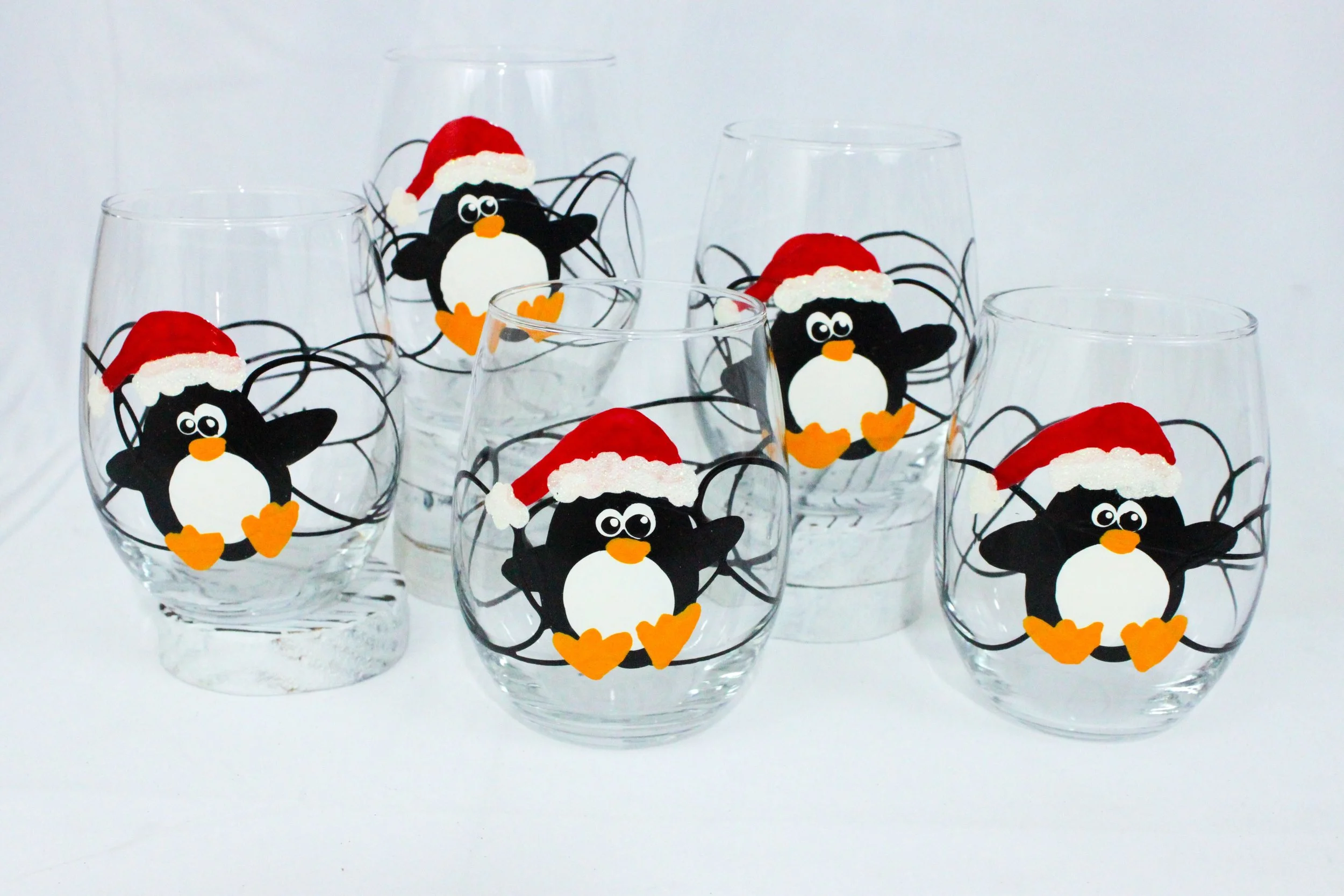 penguin glasses holiday penguins hand painted glassware christmas glasses.jpg