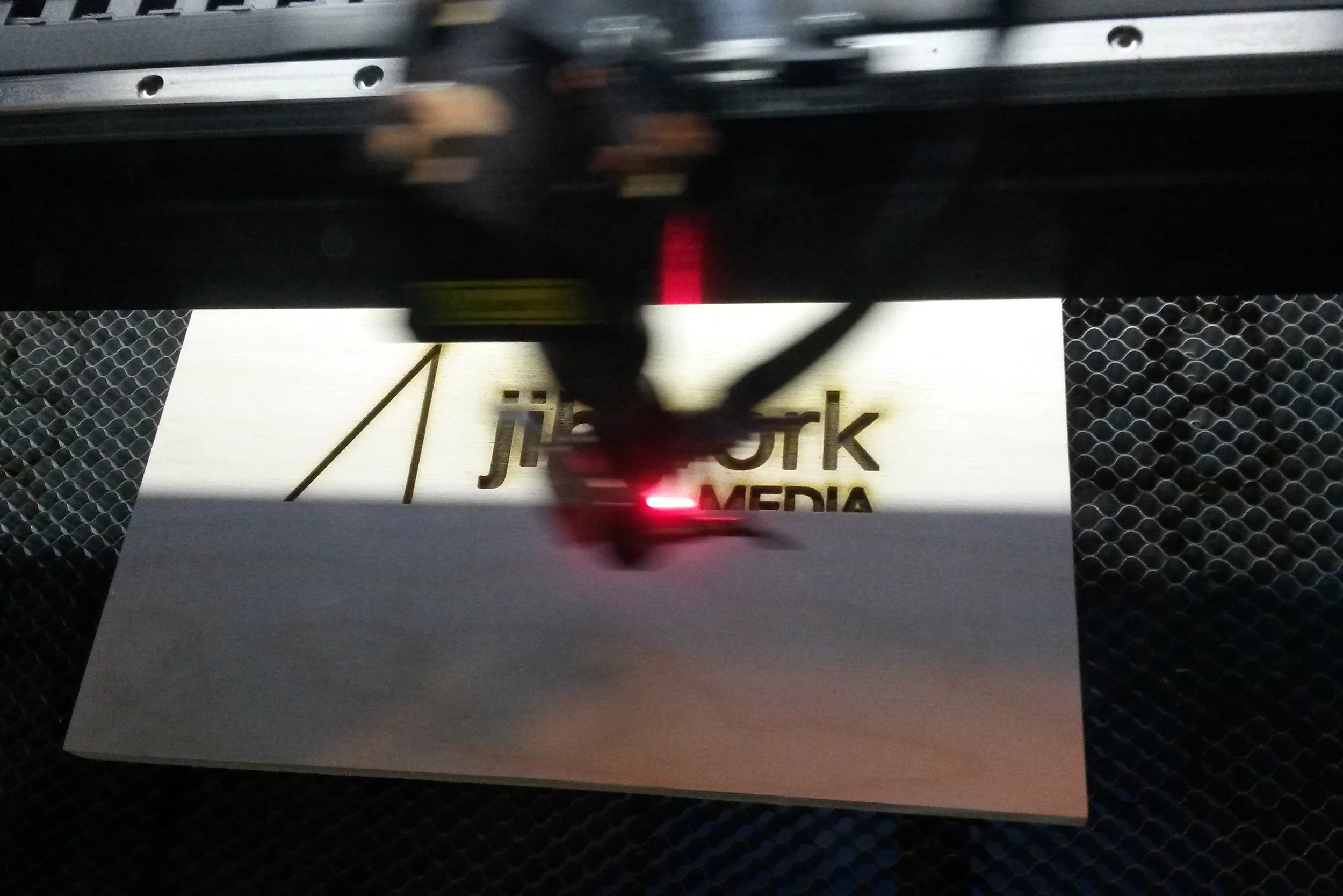 laser etching a logo in hardwood for my sisters web media company