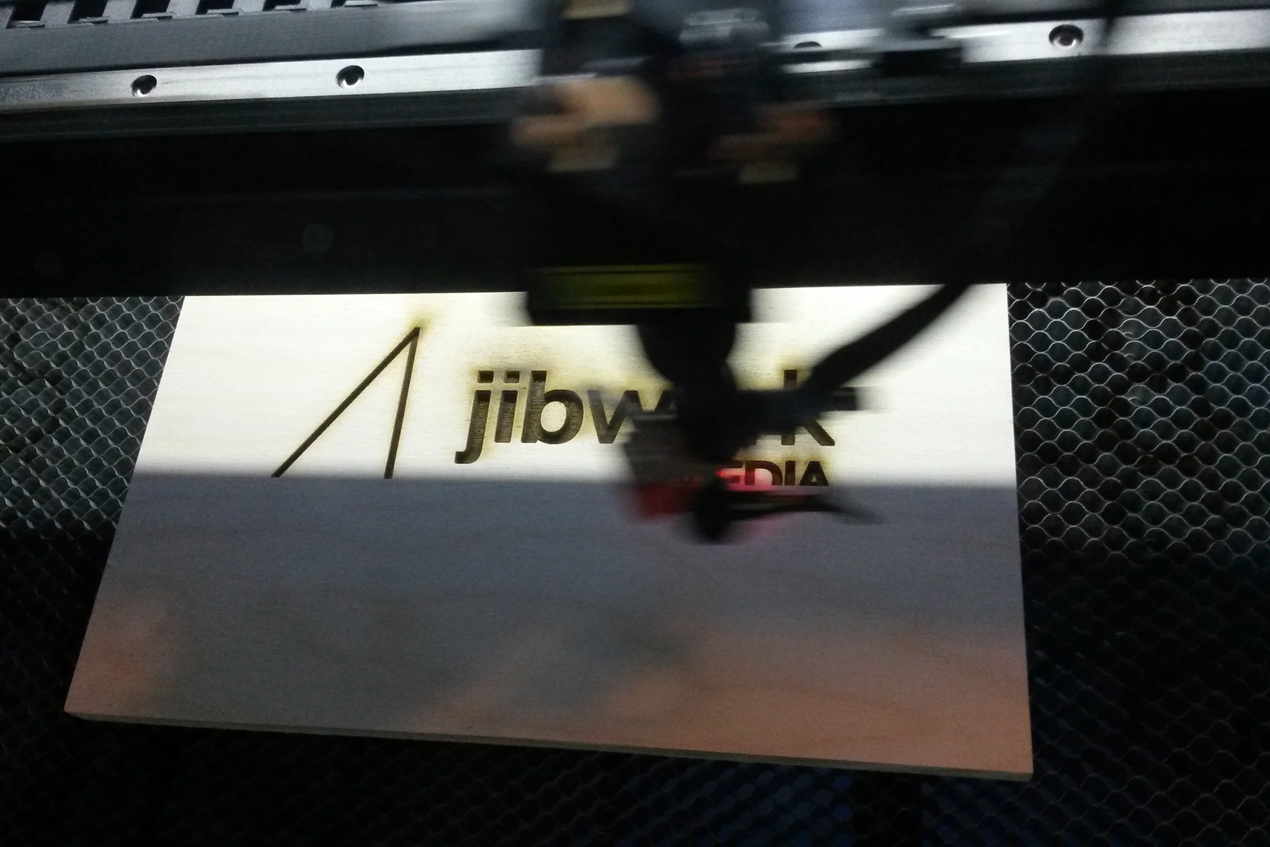 laser etching a logo in hardwood for my sisters web media company