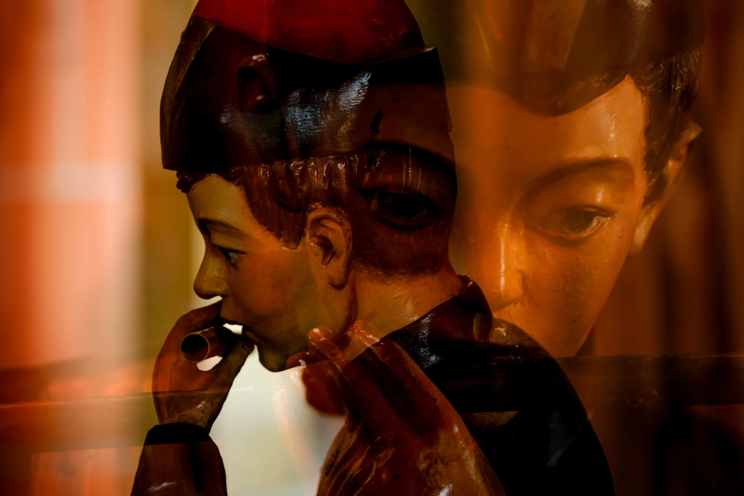 Flute Statue ©Sean Ginnane 2018 Fujifilm XT-1, 50-140mm lens. 1/30 at f/3.6 This image is a good illustration of the 'cubism' perspective. Sean has shown us two views of the statue simultaneously, giving us more information than we would get with one image.