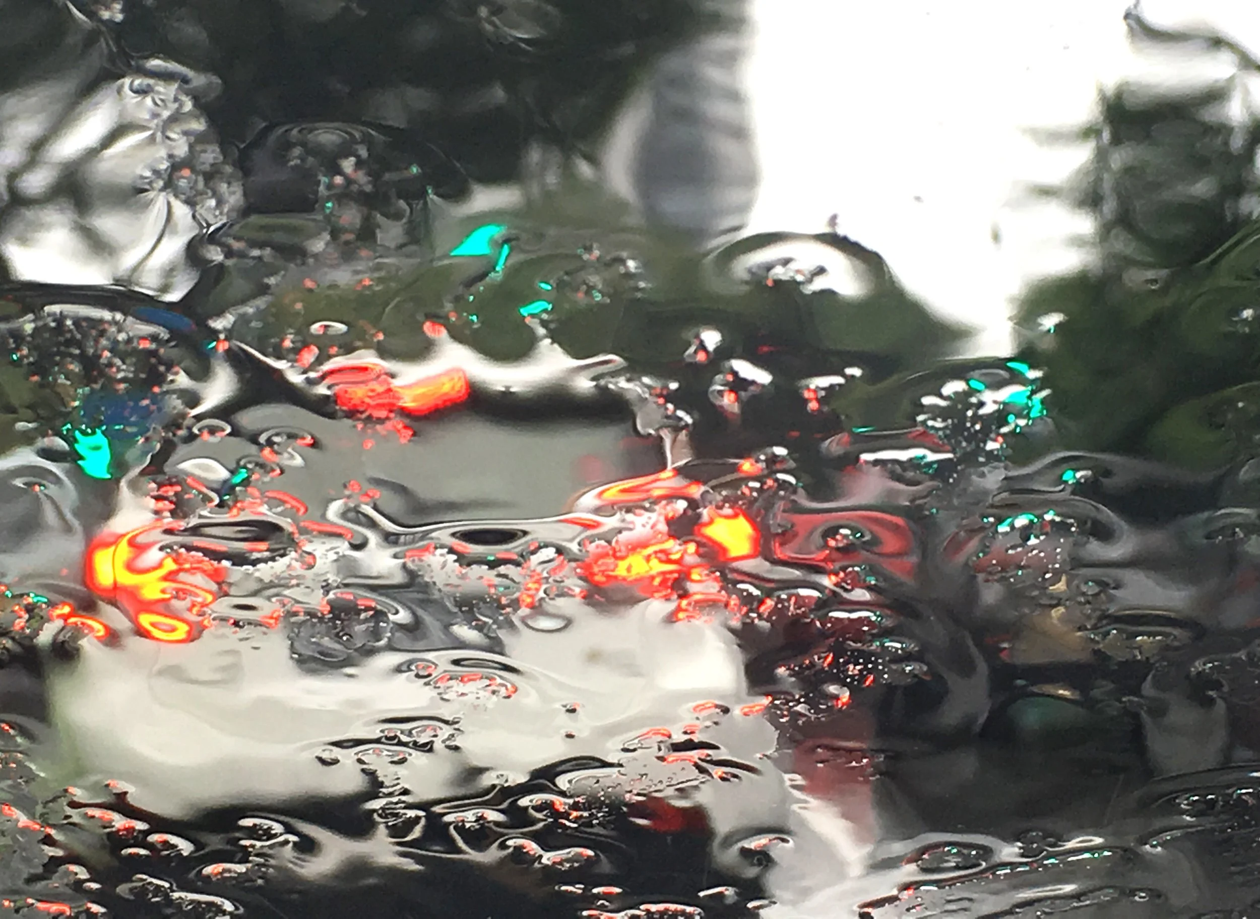 WEEK 2: Rain. 'Through The Rain' © Naida Ginnane 2018, iPhone 6s. This one was oodles of fun to shoot- apart from the fact that I was driving at the time- stopped at the lights, with the wipers off to capture the water patterns on the windscreen.