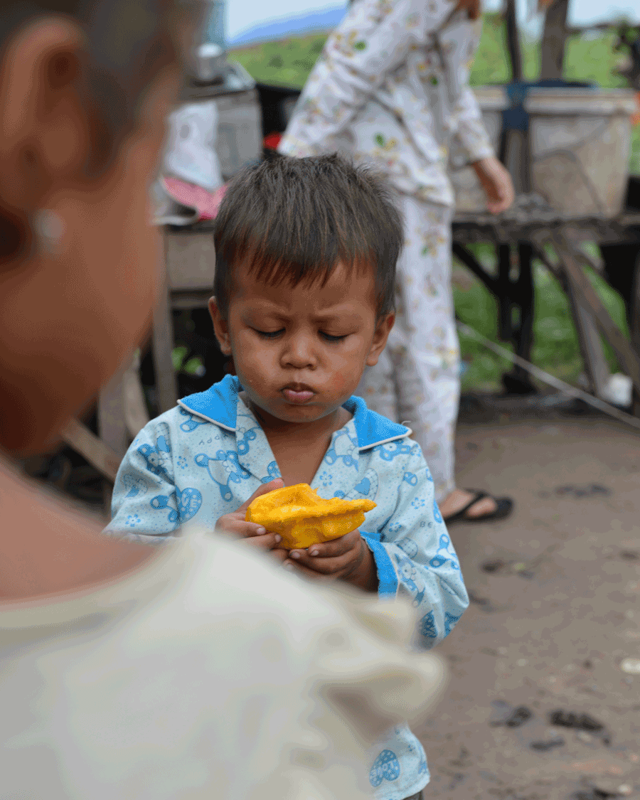  'Mango Treat' © Naida Ginnane 2016 Nikon D800 24-70mm lens, 1/160 f/7.1 ISO 100. This image of a boy eating mango is a great example of a narrow depth of field because only the middle ground is in focus. DOF is very useful device to draw your viewer's attention to the most important part of your image.