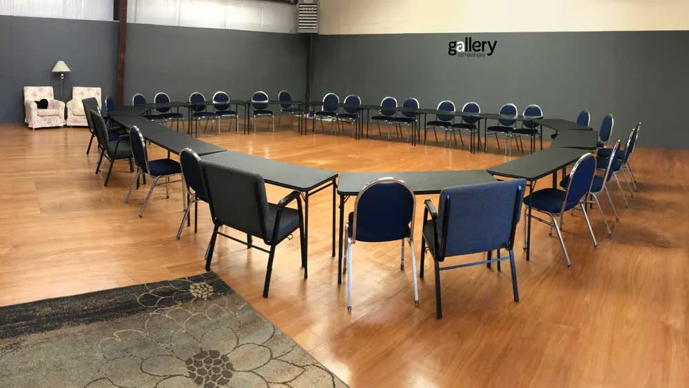 The gallery space, set up for a Shakespeare Reading Group.