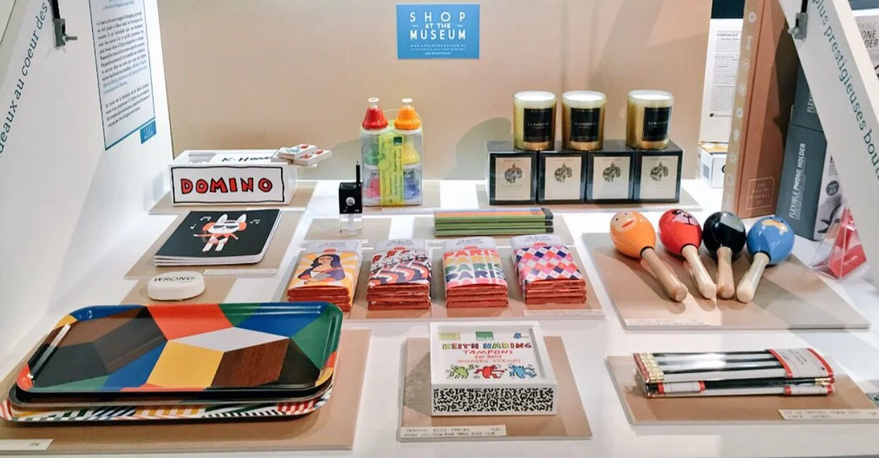 Shop at the Museum Christmas Pop Up Products Display at La Gaîté Lyrique, Paris - Photo courtesy of Yannick Debain. In this display, products include : Keith Haring Dominoes, Ich et Kar trays, I AM A Morse Code Pencils, Le Chocolat Des Francais chocolate and many many more very colourful and fun items. Shop Now at Shop at the Museum , and don't miss out to visit the store at La Gaîté Lyrique!